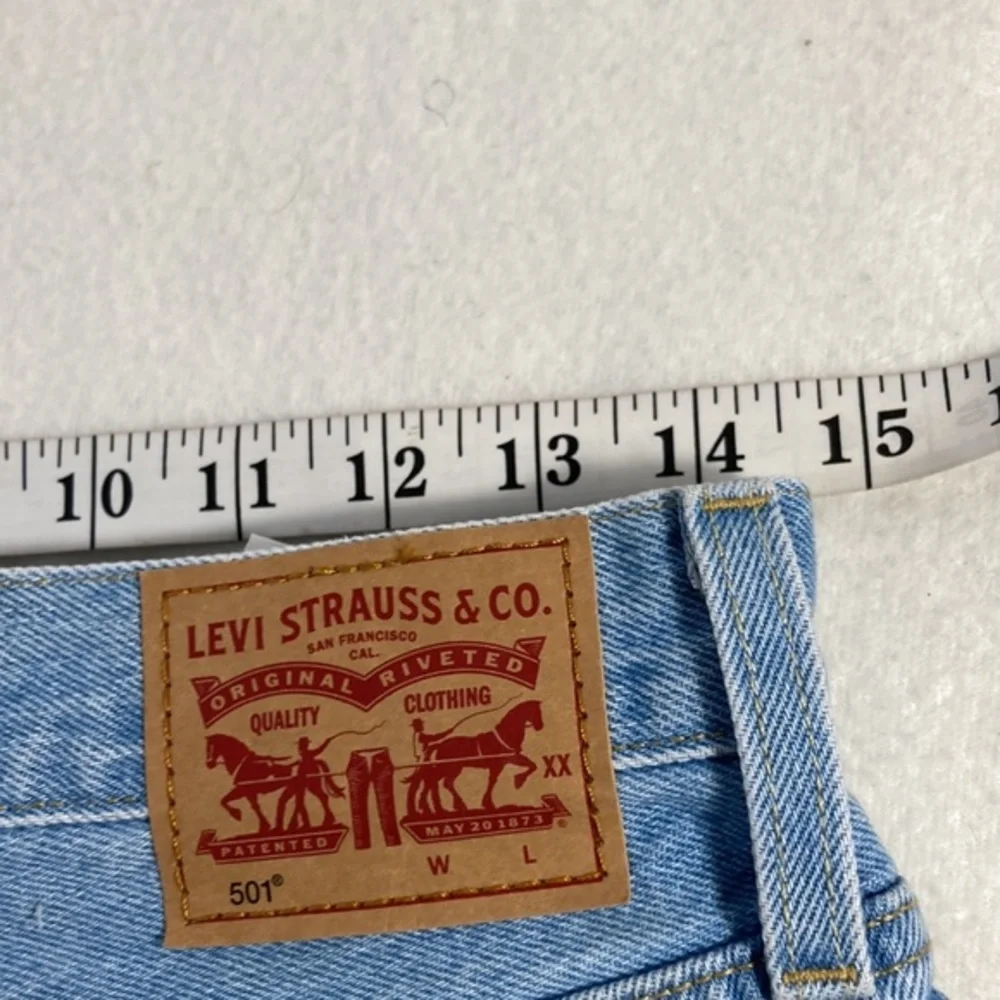 501 Light Stone Wash High Rise Distressed Denim Shorts